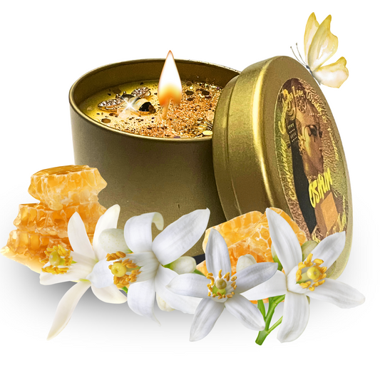 Oshun spell candle topped with citrine, clear quartz, and rose petals